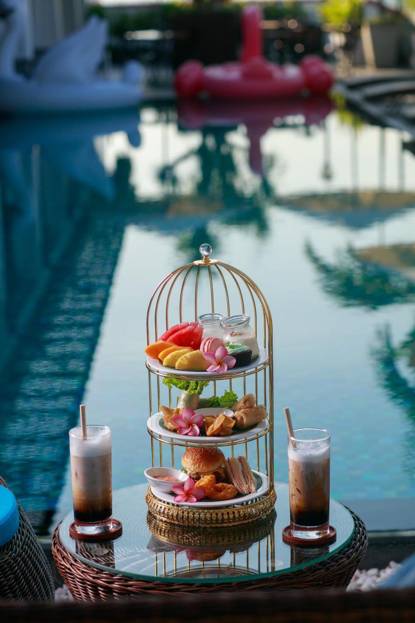 Grand Sunrise Palace Hoi An- A Luxury Indochine Hotel & Spa Экстерьер фото Afternoon tea at the Royal Mirage